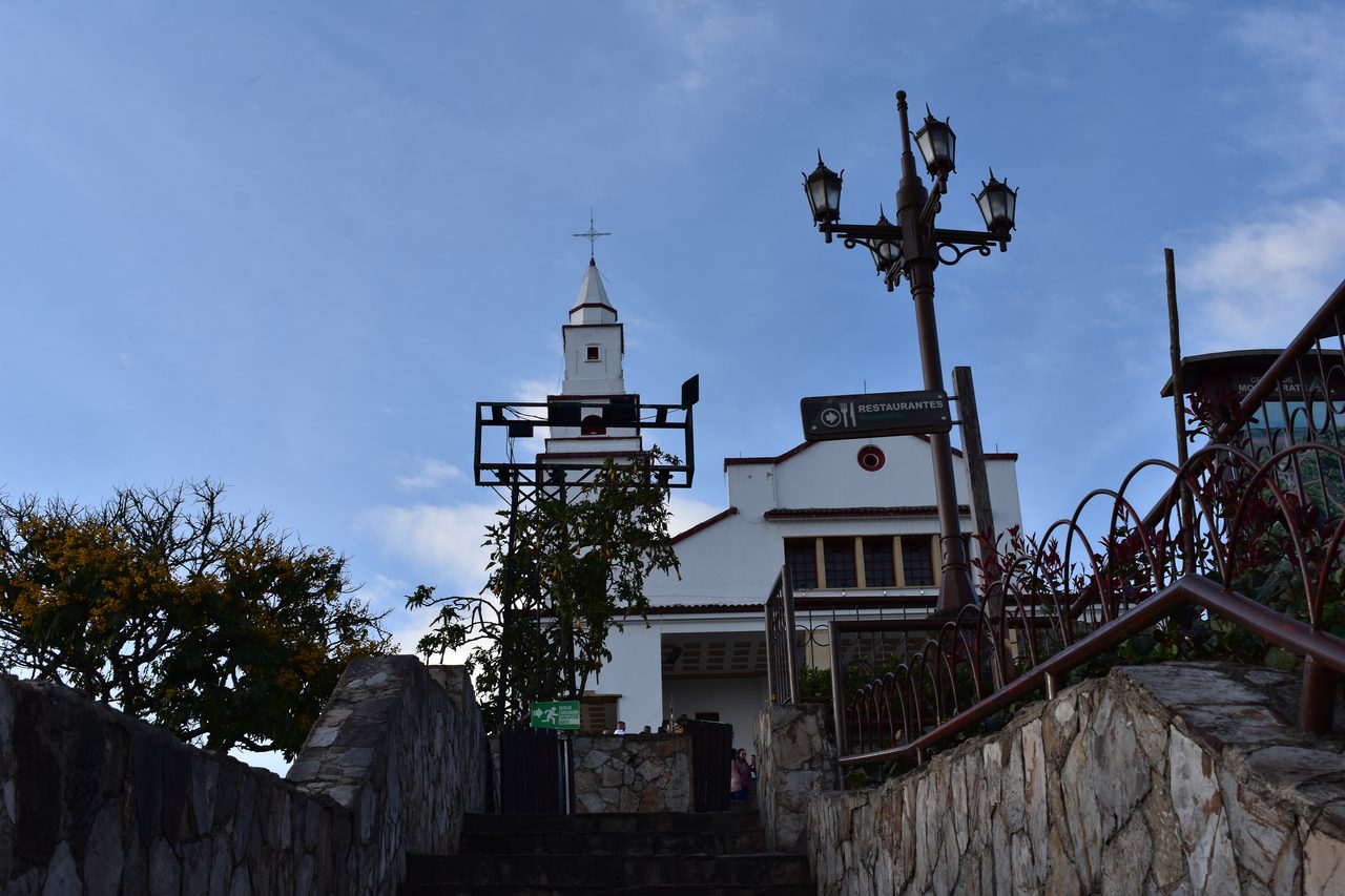 Experience the Sunset Behind the Andes from Cerro de Monserrate with Panoramic Views of Bogotá