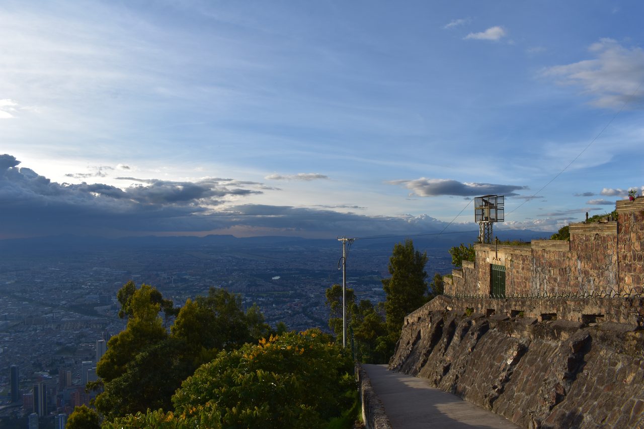 Experience the Sunset Behind the Andes from Cerro de Monserrate with Panoramic Views of Bogotá
