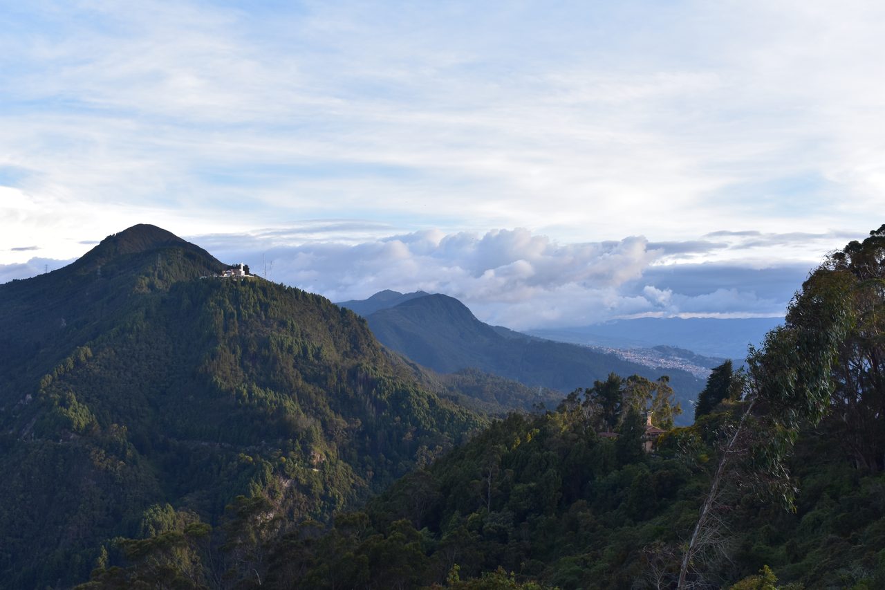 Experience the Sunset Behind the Andes from Cerro de Monserrate with Panoramic Views of Bogotá