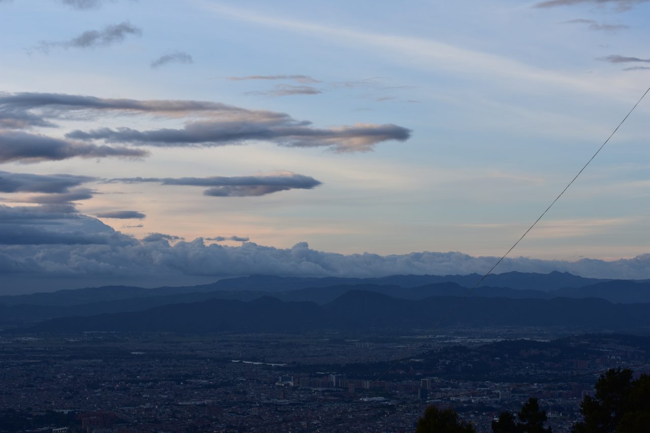 Experience the Sunset Behind the Andes from Cerro de Monserrate with Panoramic Views of Bogotá