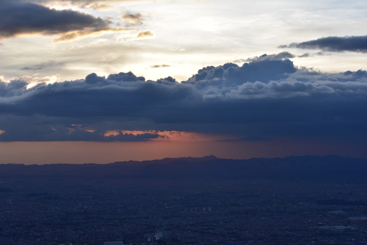 Experience the Sunset Behind the Andes from Cerro de Monserrate with Panoramic Views of Bogotá