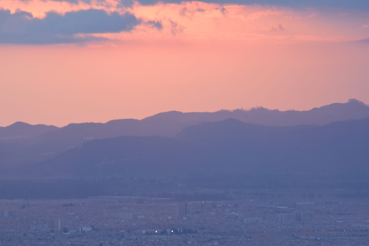 Experience the Sunset Behind the Andes from Cerro de Monserrate with Panoramic Views of Bogotá