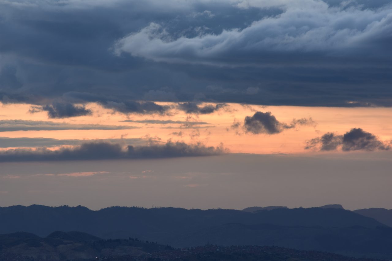 Experience the Sunset Behind the Andes from Cerro de Monserrate with Panoramic Views of Bogotá